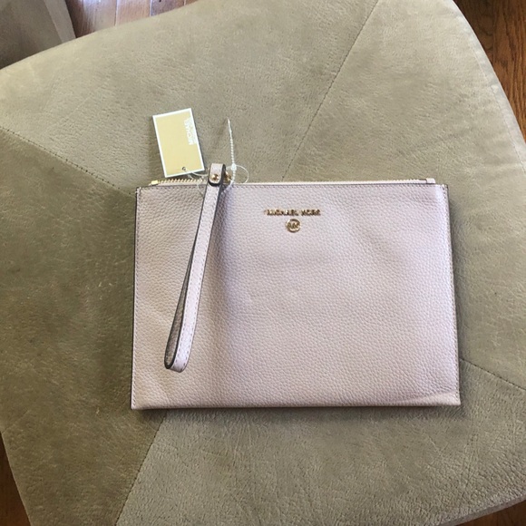 Michael kors large light pink wristlet with gold hardware. - Picture 3 of 10